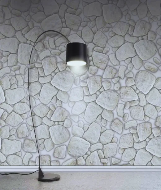 Parede de pedra moledo com luminária de leitura